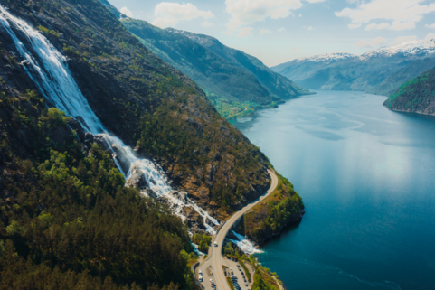 Natural landscape with a mountain waterfall and fjord