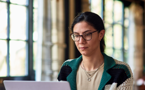 Woman looking at a laptop
